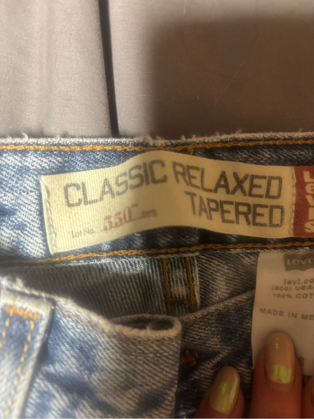 Levi's Light Blue Denim Relaxed Tapered Jeans with Gold Stitching